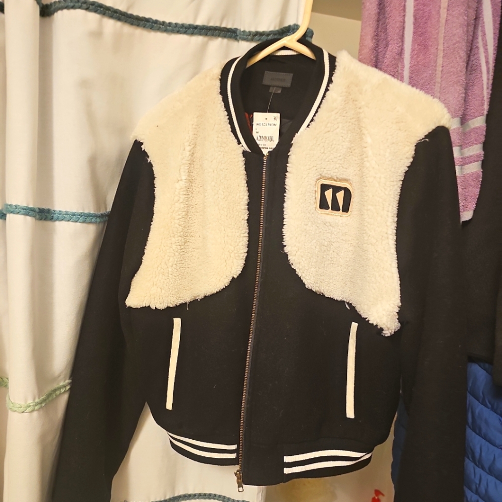 Woman's coat by "Mother"